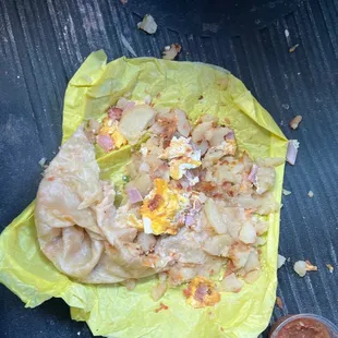 Ham breakfast burrito  But looks like dog throw up