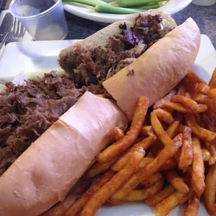 Cheesesteak with onions, plus fries.