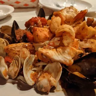 a plate of seafood and clams