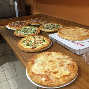 a variety of pizzas