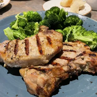 Greek pork chops with a side of broccoli