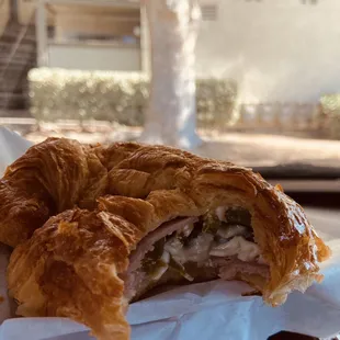 Ham and cheese croissant with jalapeño