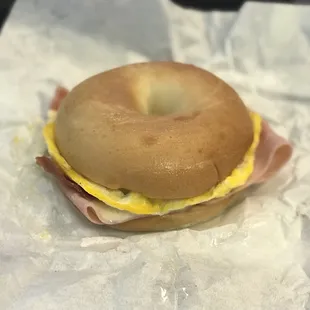 Bagel, egg, cheese, ham and bacon! Perfect toasted!