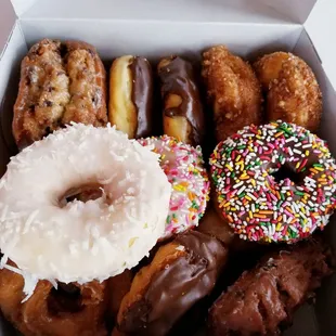 a variety of donuts in a box