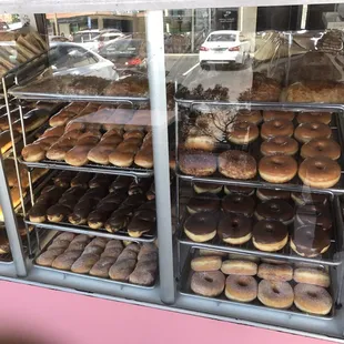 a display case full of donuts