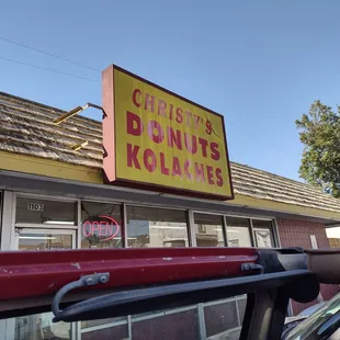 a car parked in front of the store