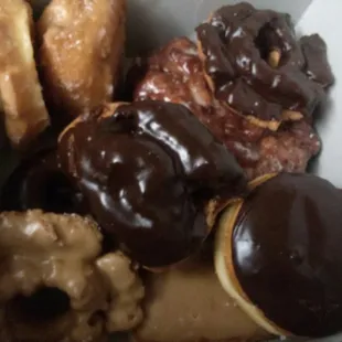 Dozen donuts (add 2 large apple fritters for 65 cents extra each) minus 2 donuts eaten by my donut monster on the drive home.