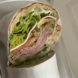 a sandwich in a styrofoam container