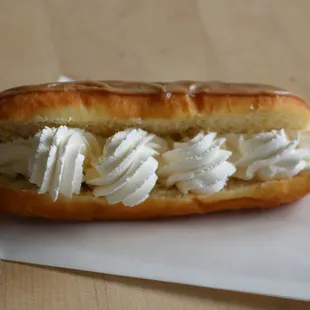 a pastry with whipped cream