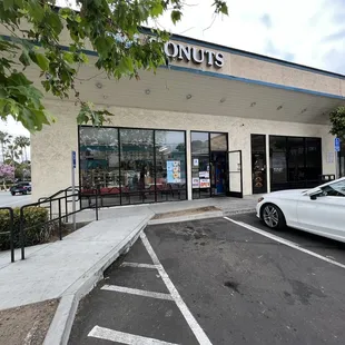 a car parked in front of the store