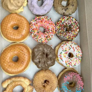 a variety of donuts in a box