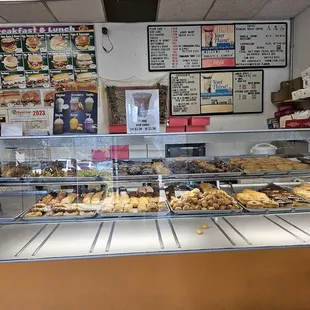 a display case filled with donuts