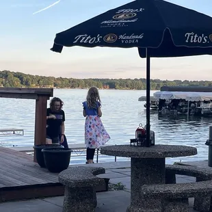 Outside seating and docks with access to Lake Waubesa