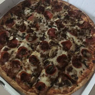 Large pizza with Pepperoni, Mushroom, Sausage and Extra Cheese