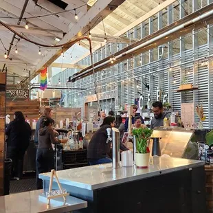 Industrial setting.  Good vibes.  Great coffee and delicious pastries from a local baking Co. Too.