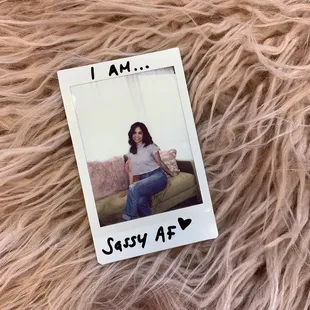 She's building a wall of her client selfies, so cute!