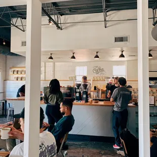 a group of people in a cafe