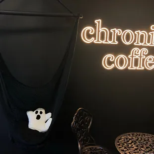 a ghost sitting in a hammock