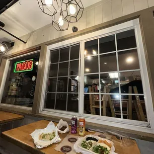 a table with food and a window