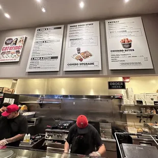 a man preparing food in a restaurant