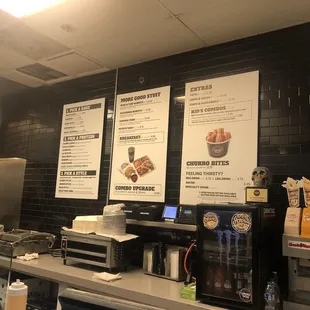 menus on the wall of a restaurant