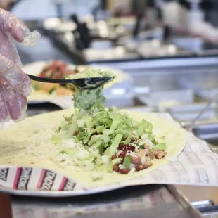 a person preparing food in a kitchen