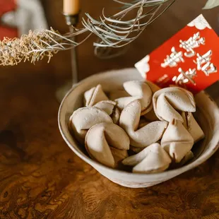 a bowl of fortune cookies