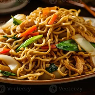 a plate of stir fried noodles