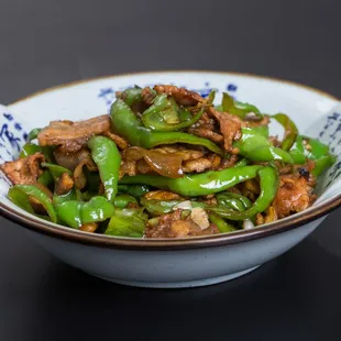 a bowl of stir fried vegetables