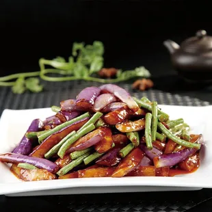 a plate of stir fried vegetables