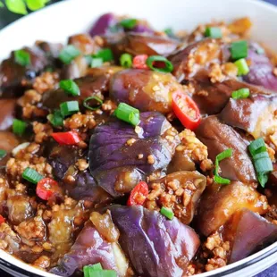 a bowl of stir fried eggplant