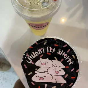 a cup of milkshake and a paper plate