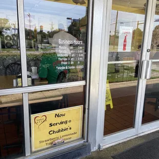 a sign in the window