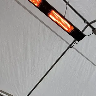 Heat lamps in the tent outside - they're so warm it's lovely in this tent!