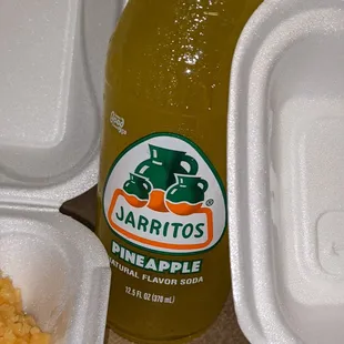 a bottle of jarriitos pineapple