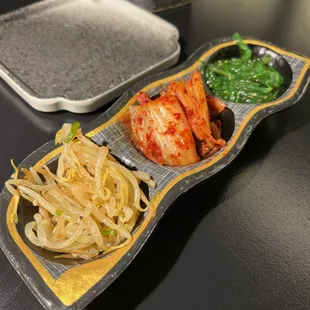 Bean sprouts, kimchi, seaweed salad