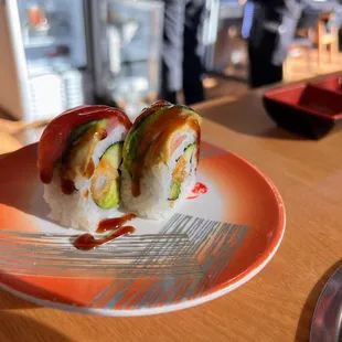 a sushi roll on a plate