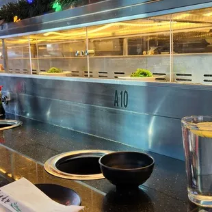 Bar setting with access to the conveyor belt sushi!