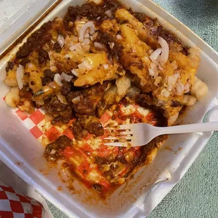 Chilli fries  Add Cheese  onions