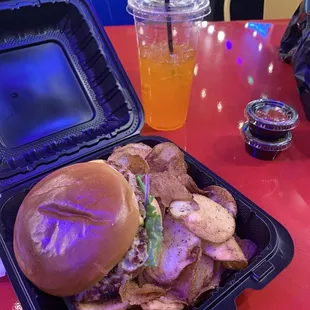 The double cheeseburger with lemon pepper chips and Orange Fanta drink