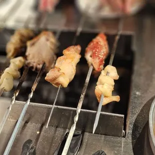 Different skewers and noodle
