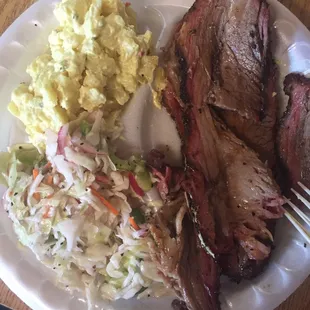 Beef brisket, potato salad and cole slaw. Fired picked are yummy too.