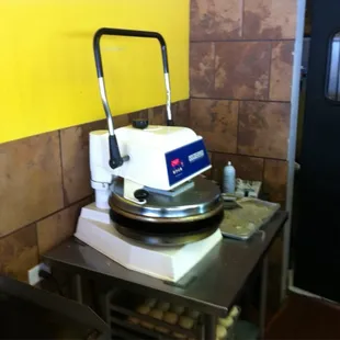 PERFECTLY DIALED IN TORTILLA PRESS. The tortillas are fresh made for each customer as you order.