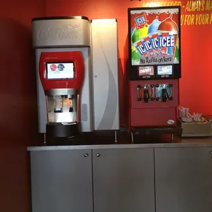 a soda machine and a soda dispenser