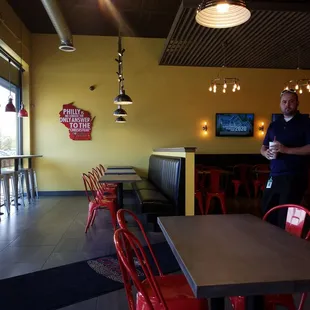 a man standing in a restaurant