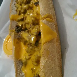 Side view of steak and cheese wiz.