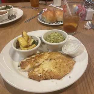 Almond crusted tilapia with mixed veggies and broccoli rice. Unsweetened tea with lemon to drink. Yum.