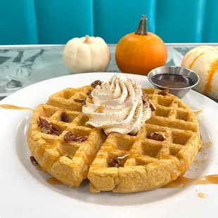 Pumpkin Spice Waffle, topped with whipped cream, caramel drizzle, pecans &amp; pumpkin spice