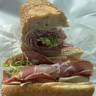 Old World Italian - Prosciutto, hot dried capicola, sweet Sopressata &amp; sharp provolone on a Liscio's seeded roll. Above average