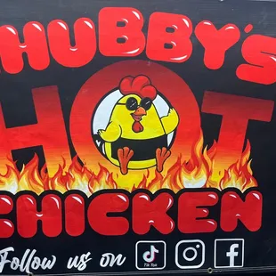 a chicken on a sign